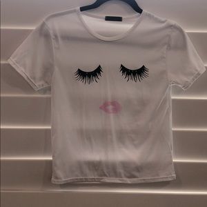 White T-shirt with eyelashes and pink lips